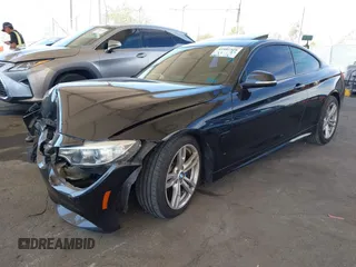 2014 BMW 4 Series 428i with VIN WBA3N7C51EK220125, listed as a IAAI auction lot 41881928 with 129,810 mi miles and . Bid and sale history available at carsss.com. Image 18.