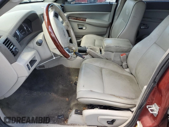2009 Jeep Grand Cherokee with VIN 1J8HR68T29C512518, listed as a Copart auction lot 58894174 with 113,181 mi miles and Salvage title. Bid and sale history available at DreamBid. Image 7.