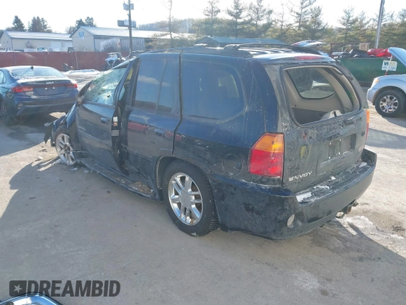 2007 GMC Envoy Denali with VIN 1GKET63M072227691, listed as a IAAI auction lot 41612371 with 154,001 mi miles. Bid and sale history available at carsss.com. Image 3.