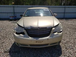 2010 Chrysler Sebring Limited z VIN 1C3CC5FB0AN179398, wystawiony jako Copart lot #57034905 z przebiegiem 184 988 mil mil oraz Czysty tytuł • Clean title. Historia ofert i sprzedaży dostępna na DreamBid. Obrazek 5.