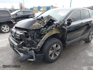 2020 Honda CR-V LX with VIN 2HKRW2H2XLH671349, listed as a IAAI auction lot 41204020 with 71,374 mi miles. Bid and sale history available at carsss.com. Image 6.