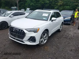 2020 Audi Q3 S line Premium with VIN WA1DECF30L1115390, listed as a IAAI auction lot 42503728 with 18,556 mi miles and . Bid and sale history available at DreamBid. Image 2.