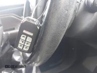 2018 Honda Odyssey EX-L z VIN 5FNRL6H74JB031306, wystawiony jako IAAI lot #41603478 z przebiegiem Nie podano mil oraz . Historia ofert i sprzedaży dostępna na DreamBid. Obrazek 11.