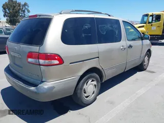 2001 Toyota Sienna LE z VIN 4T3ZF13C11U365141, wystawiony jako IAAI lot #42336826 z przebiegiem 347 176 mil mil oraz . Historia ofert i sprzedaży dostępna na DreamBid. Obrazek 4.