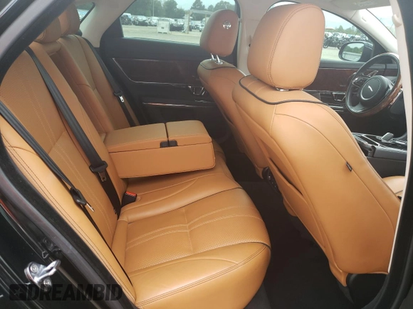 2017 Jaguar XJ with VIN SAJWA1C73H8W10544, listed as a Copart auction lot 70025724 with 64,437 mi miles and Salvage Title. Bid and sale history available at carsss.com. Image 10.
