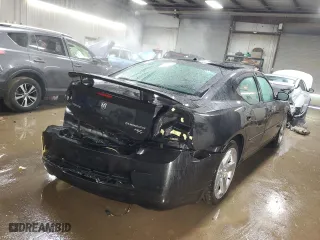 2010 Dodge Charger Road/Track with VIN 2B3CA8CT8AH288444, listed as a Copart auction lot 49392795 with 104,119 mi miles and Salvage Title. Bid and sale history available at carsss.com. Image 3.