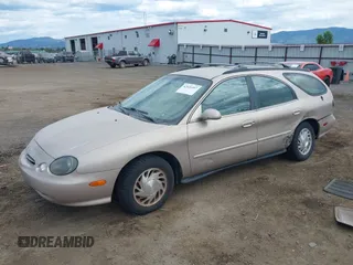1998 Ford Taurus with VIN 1FAFP57U8WG275844, listed as a IAAI auction lot 42426107 with 318,654 mi miles and . Bid and sale history available at DreamBid. Image 17.