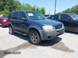 2001 Ford Escape XLT with VIN 1FMCU041X1KF10409, listed as a IAAI auction lot 39780383 with 246,336 mi miles. Bid and sale history available at carsss.com. Image 1.