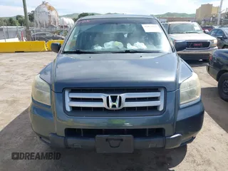 2006 Honda Pilot LX with VIN 2HKYF18146H556070, listed as a IAAI auction lot 42011915 with 145,112 mi miles and . Bid and sale history available at DreamBid. Image 6.