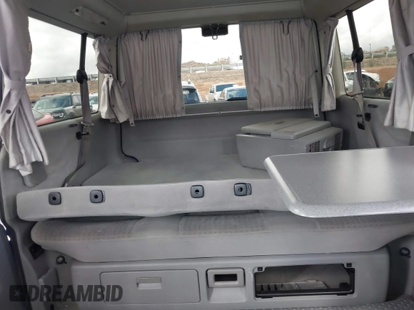 2002 Volkswagen EuroVan MV с VIN WV2NB47002H005993, выставлен на аукционе IAAI как лот 41568379 с пробегом 143 133 миль миль и . История ставок и продаж доступна на DreamBid. Изображение 8.