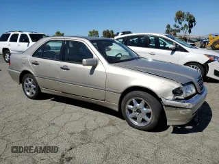 1998 Mercedes-Benz C 230/260/280/320 with VIN WDBHA23G4WA564563, listed as a Copart auction lot 71414284 with 277,741 mi miles and Salvage Title. Bid and sale history available at carsss.com. Image 4.