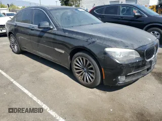 2012 BMW 7 Series 740i with VIN WBAKA4C59CDS99437, listed as a Copart auction lot 73795104 with 120,199 mi miles and Clean Title. Bid and sale history available at carsss.com. Image 4.