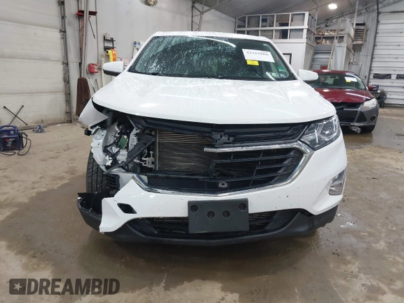 2018 Chevrolet Equinox LT z VIN 3GNAXSEVXJS587177, wystawiony jako IAAI lot #42322966 z przebiegiem 73 893 mil mil oraz . Historia ofert i sprzedaży dostępna na DreamBid. Obrazek 12.