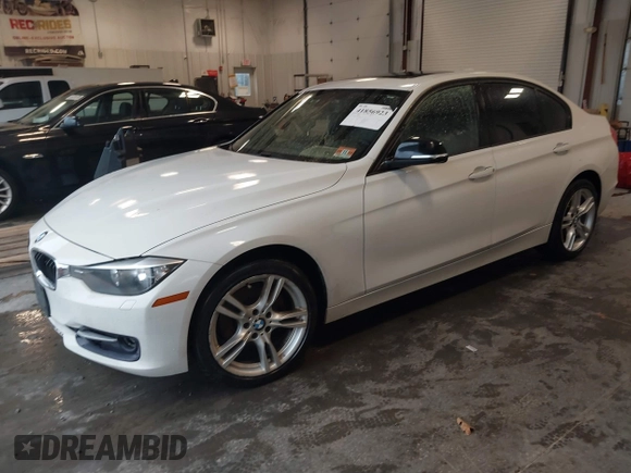 2014 BMW 3 Series 328i xDrive with VIN WBA3B5C53EP543964, listed as a IAAI auction lot 41856923 with 149,440 mi miles. Bid and sale history available at carsss.com. Image 2.
