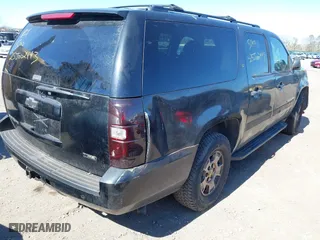 2009 Chevrolet Suburban LT w/1LT with VIN 1GNFK26309R273831, listed as a IAAI auction lot 41766177 with 999,999 mi miles. Bid and sale history available at carsss.com. Image 4.
