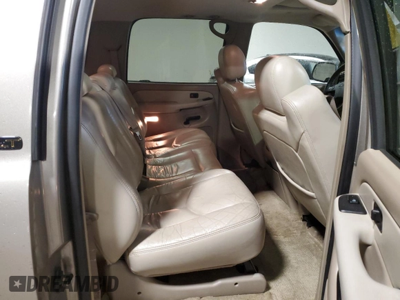 2003 Chevrolet Suburban LT z VIN 1GNFK16Z53J282237, wystawiony jako Copart lot #56275545 z przebiegiem 129 384 mil mil oraz Szkoda całkowita • Salvage title. Historia ofert i sprzedaży dostępna na DreamBid. Obrazek 11.