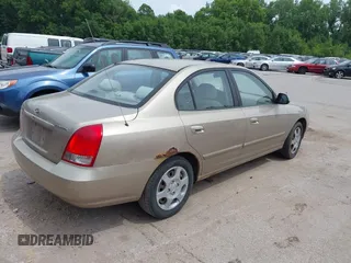 2003 Hyundai Elantra GLS z VIN KMHDN45D73U556305, wystawiony jako IAAI lot #42478211 z przebiegiem 149 648 mil mil oraz . Historia ofert i sprzedaży dostępna na DreamBid. Obrazek 4.