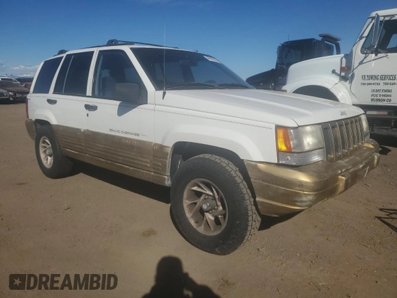1998 Jeep Grand Cherokee Laredo with VIN 1J4GZ58S9WC361042, listed as a Copart auction lot 46802365 with 236,923 mi miles and Salvage Title. Bid and sale history available at carsss.com. Image 4.