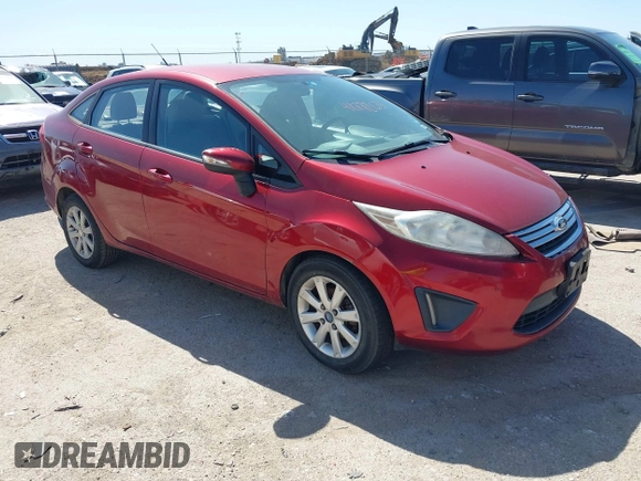 2013 Ford Fiesta SE z VIN 3FADP4BJ0DM107682, wystawiony jako IAAI lot #41772631 z przebiegiem 146 760 mil mil oraz . Historia ofert i sprzedaży dostępna na DreamBid. Obrazek 1.