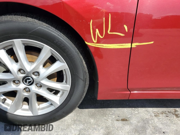 2015 Mazda 3 i Grand Touring z VIN 3MZBM1M77FM223990, wystawiony jako Copart lot #54905545 z przebiegiem Nie podano mil oraz Szkoda całkowita • Salvage title. Historia ofert i sprzedaży dostępna na DreamBid. Obrazek 12.