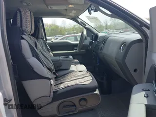 2005 Ford F-150 STX with VIN 1FTRX14W85NA00409, listed as a IAAI auction lot 42125903 with 160,230 mi miles and . Bid and sale history available at DreamBid. Image 5.