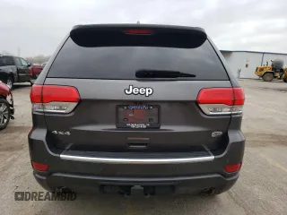 2014 Jeep Grand Cherokee Overland with VIN 1C4RJFCG8EC155109, listed as a Copart auction lot 52992825 with 128,604 mi miles and Clean Title. Bid and sale history available at carsss.com. Image 6.