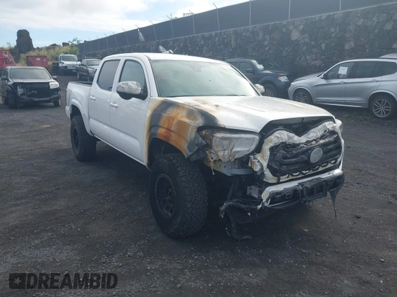 2023 Toyota Tacoma SR with VIN 3TYCZ5AN4PT168312, listed as a IAAI auction lot 42555775 with 8,288 mi miles and . Bid and sale history available at DreamBid. Image 6.