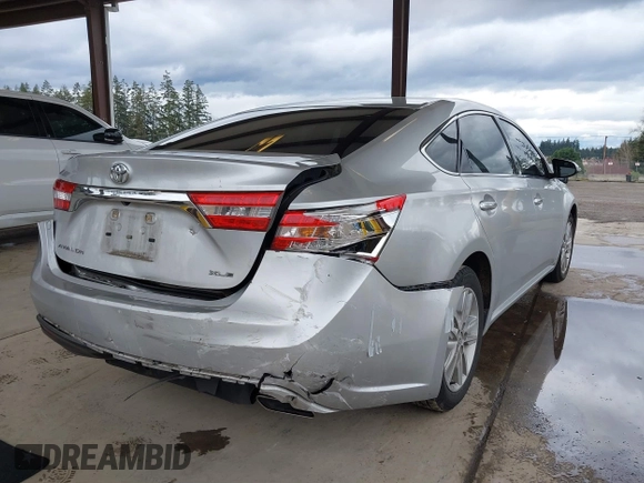 2014 Toyota Avalon Limited with VIN 4T1BK1EB3EU104576, listed as a IAAI auction lot 41773431 with 105,419 mi miles. Bid and sale history available at carsss.com. Image 4.