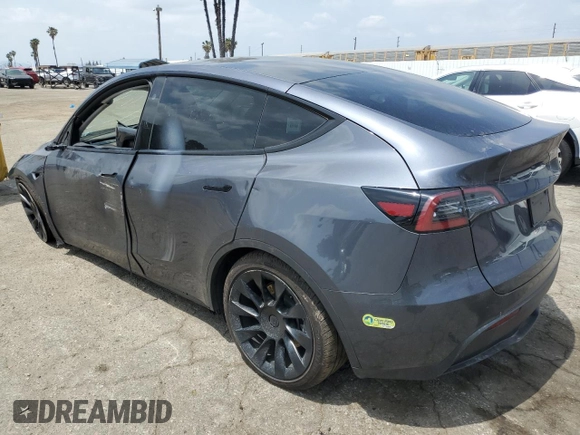 2023 Tesla Model Y Long Range with VIN 7SAYGDEE4PF899390, listed as a Copart auction lot 54361685 with Not Provided miles and Clean Title. Bid and sale history available at DreamBid. Image 2.