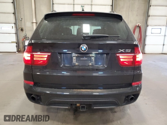 2011 BMW X5 35i z VIN 5UXZV4C52BL743475, wystawiony jako Copart lot #56238615 z przebiegiem 218 738 mil mil oraz Szkoda całkowita • Salvage title. Historia ofert i sprzedaży dostępna na DreamBid. Obrazek 6.