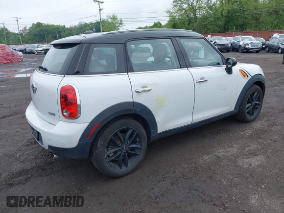2013 MINI Countryman with VIN WMWZB3C53DWM08244, listed as a IAAI auction lot 42281364 with 139,894 mi miles and . Bid and sale history available at DreamBid. Image 4.