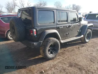 2018 Jeep Wrangler Unlimited Sport S z VIN 1C4HJXDG9JW172686, wystawiony jako IAAI lot #41742837 z przebiegiem 89 888 mil mil oraz . Historia ofert i sprzedaży dostępna na DreamBid. Obrazek 4.