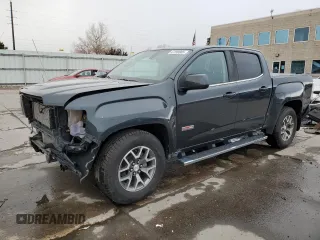2018 GMC Canyon z VIN 1GTP6CE1XJ1173875, wystawiony jako Copart lot #47258005 z przebiegiem 104 076 mil mil oraz Szkoda całkowita • Salvage title. Historia ofert i sprzedaży dostępna na DreamBid. Obrazek 1.