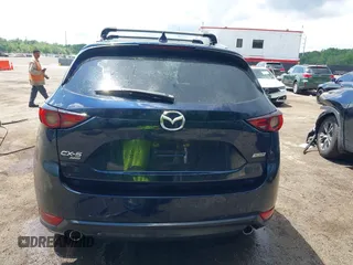 2018 Mazda CX-5 Grand Touring with VIN JM3KFBDM2J0373386, listed as a IAAI auction lot 42200795 with 70,111 mi miles and . Bid and sale history available at DreamBid. Image 17.
