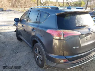 2016 Toyota RAV4 XLE with VIN 2T3WFREV0GW266691, listed as a IAAI auction lot 41804023 with 77,000 mi miles. Bid and sale history available at carsss.com. Image 3.