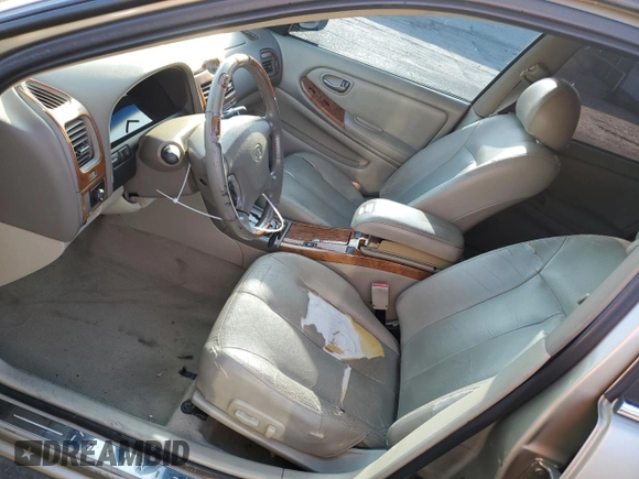 2002 Infiniti I35 Luxury z VIN JNKDA31A12T025612, wystawiony jako Copart lot #71493464 z przebiegiem 80 210 mil mil oraz Szkody całkowita. Historia ofert i sprzedaży dostępna na DreamBid. Obrazek 7.