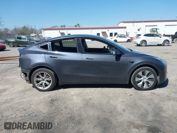 2021 Tesla Model Y Long Range with VIN 5YJYGDEE4MF119249, listed as a IAAI auction lot 41764711 with 87,796 mi miles. Bid and sale history available at carsss.com. Image 14.