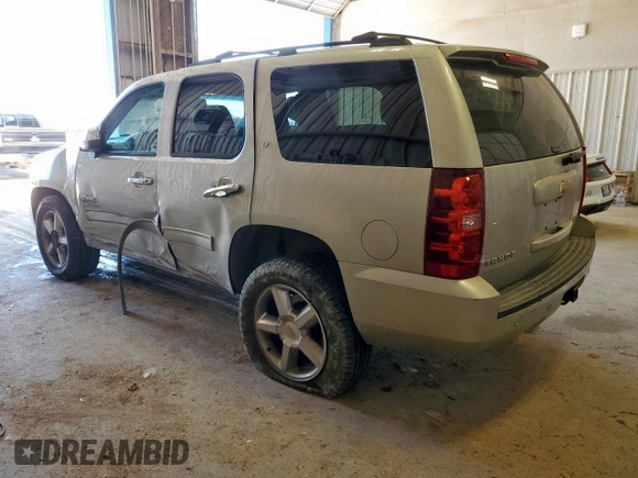 2014 Chevrolet Tahoe LT with VIN 1GNSCBE04ER108507, listed as a Copart auction lot 60931255 with 167,098 mi miles and Salvage title. Bid and sale history available at DreamBid. Image 2.