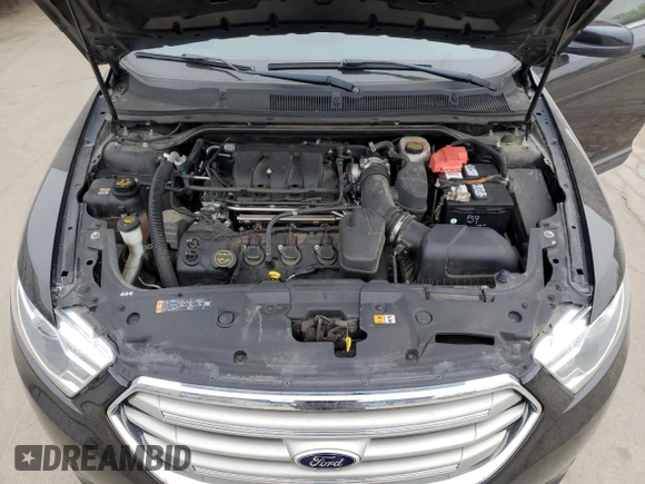 2015 Ford Taurus SEL with VIN 1FAHP2H87FG145689, listed as a Copart auction lot 56294115 with 81,029 mi miles and Salvage title. Bid and sale history available at DreamBid. Image 11.