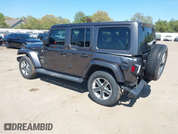 2018 Jeep Wrangler Unlimited Sahara with VIN 1C4HJXEG0JW166645, listed as a IAAI auction lot 42228492 with 58,416 mi miles and . Bid and sale history available at DreamBid. Image 3.