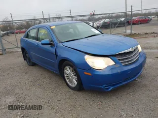 2007 Chrysler Sebring Touring with VIN 1C3LC56K47N533285, listed as a IAAI auction lot 41869938 with 189,721 mi miles and . Bid and sale history available at DreamBid. Image 1.