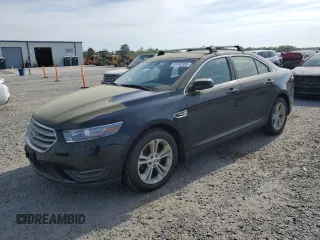 2014 Ford Taurus SEL with VIN 1FAHP2E87EG151866, listed as a Copart auction lot 52692965 with 201,680 mi miles and Clean Title. Bid and sale history available at DreamBid. Image 1.