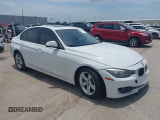 2013 BMW 3 Series 320i with VIN WBA3B1C50DK129576, listed as a IAAI auction lot 42393038 with 160,370 mi miles and . Bid and sale history available at DreamBid. Image 1.