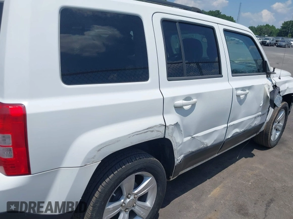 2014 Jeep Patriot Sport z VIN 1C4NJPBA3ED869659, wystawiony jako IAAI lot #42590584 z przebiegiem 60 194 mil mil oraz . Historia ofert i sprzedaży dostępna na DreamBid. Obrazek 12.