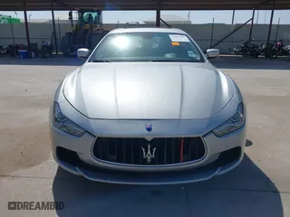 2014 Maserati Ghibli S Q4 with VIN ZAM57RTA8E1085631, listed as a IAAI auction lot 41829745 with 80,418 mi miles. Bid and sale history available at carsss.com. Image 12.