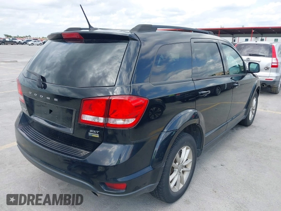 2015 Dodge Journey SXT with VIN 3C4PDCBG5FT604847, listed as a IAAI auction lot 42108853 with 164,679 mi miles. Bid and sale history available at carsss.com. Image 4.