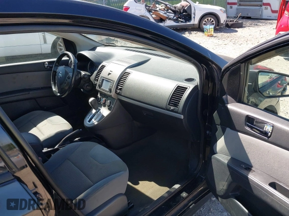 2012 Nissan Sentra S with VIN 3N1AB6AP0CL673166, listed as a IAAI auction lot 42133536 with 114,485 mi miles and . Bid and sale history available at DreamBid. Image 5.