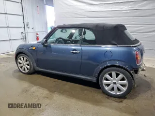 2009 MINI Convertible z VIN WMWMR335X9TJ93685, wystawiony jako Copart lot #50899755 z przebiegiem 123 609 mil mil oraz Szkoda całkowita • Salvage title. Historia ofert i sprzedaży dostępna na DreamBid. Obrazek 2.
