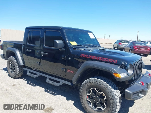 2023 Jeep Gladiator Rubicon z VIN 1C6JJTBG3PL531982, wystawiony jako IAAI lot #42211139 z przebiegiem 28 301 mil mil oraz . Historia ofert i sprzedaży dostępna na DreamBid. Obrazek 1.