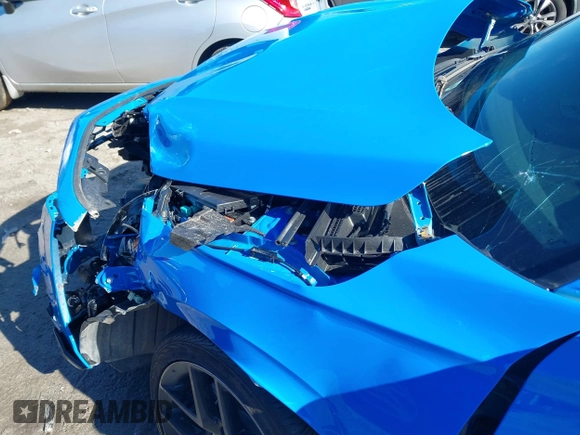 2023 Honda Civic Sport Touring z VIN 19XFL1H87PE013122, wystawiony jako IAAI lot #41309283 z przebiegiem 25 735 mil mil oraz . Historia ofert i sprzedaży dostępna na DreamBid. Obrazek 6.